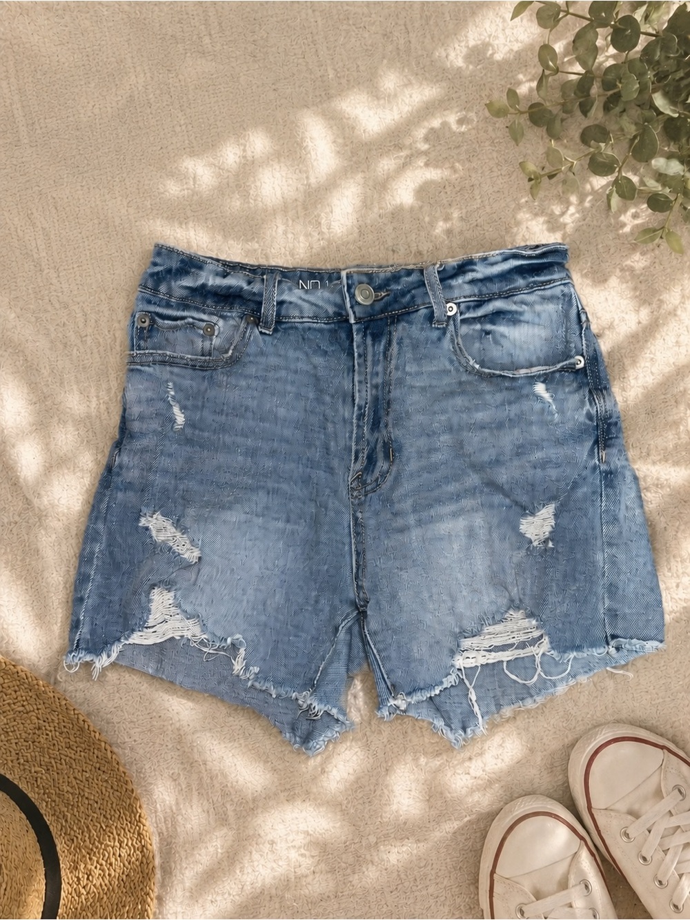distressed high-rise denim shorts – light wash